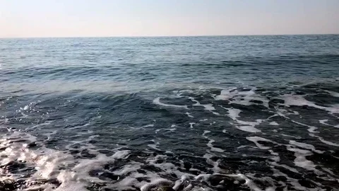 Blue sea, the waves beating against the shore Stock Footage 121331960
