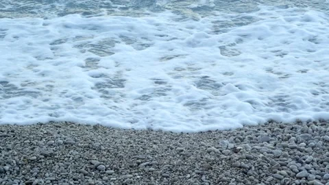 Blue sea waves close up with white foam Stock Footage 165052655