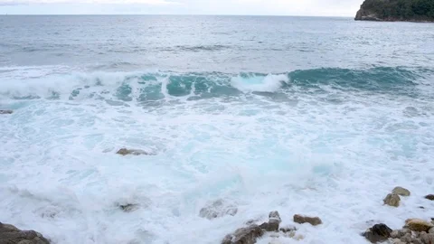 Blue sea waves at cloudy weather Stock Footage 121898257