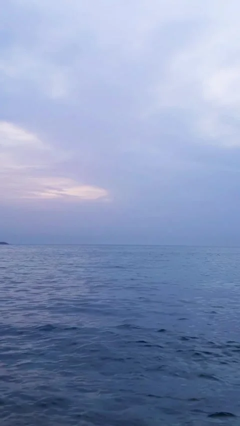 Blue Sea waves floating and hitting with stones on beach in the midnight Stock Footage 264963586