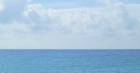 Blue sea with white clouds. Clear seascape. Stock Footage 82662142