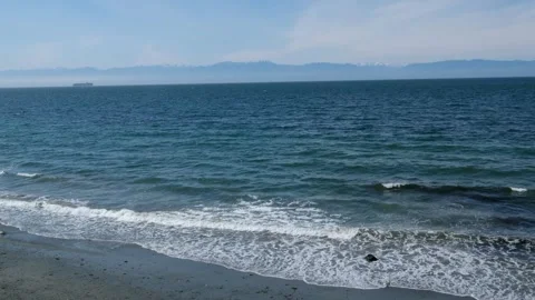 Blue sea with white waves scallops on clear day. Marine background. Bad stormy Stock Footage 314097994