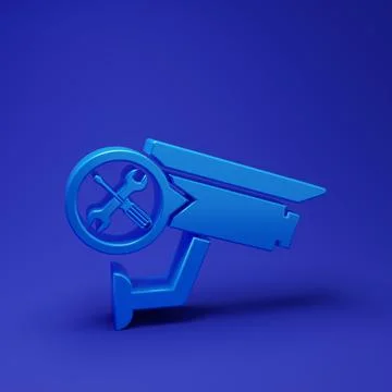 Blue Security camera with screwdriver and wrench icon isolated on blue back.. Stock Photos