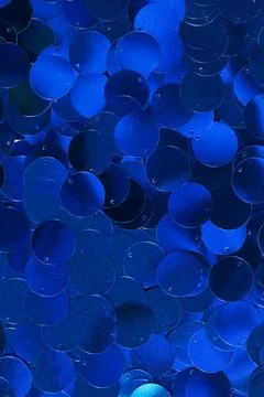 Blue sequin patterned background Stock Photos