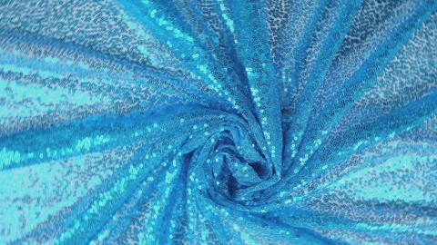 Blue sequins fabrics close up twisting as background Stock Footage 279873975