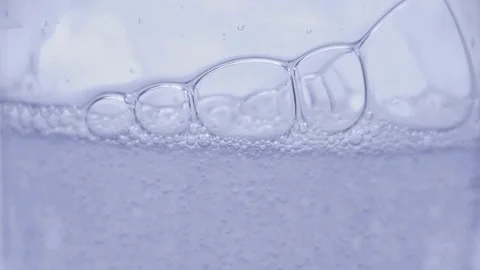 Blue Serum Droplets Floating in Clear Fluid, Luxury Skincare Concept Stock Footage 328002601