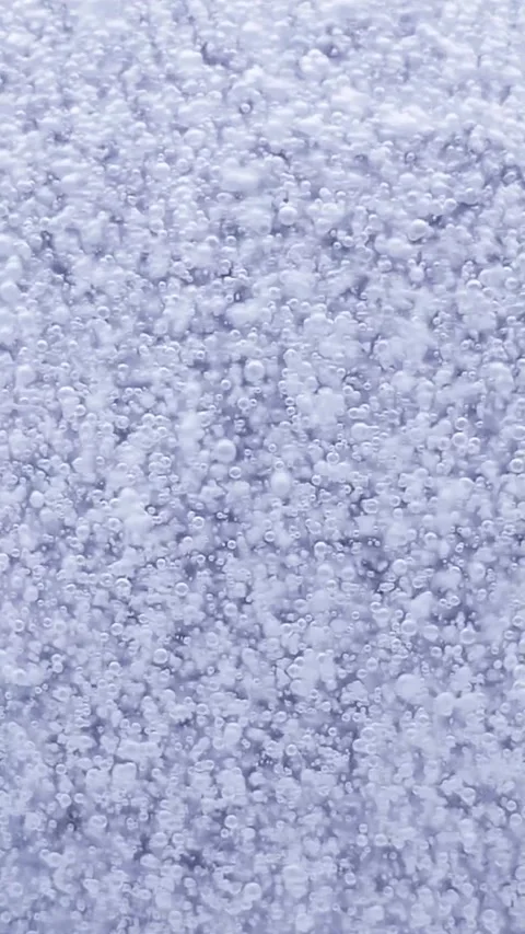 Blue Serum Droplets Floating in Clear Fluid, Luxury Skincare Concept Video stock 328002625