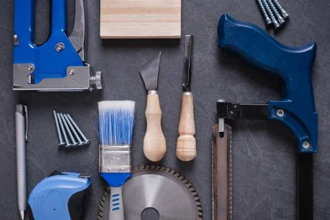 Blue set of work construction tools on the table Stock Photos