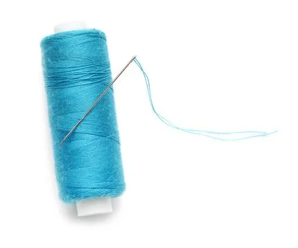 Blue sewing thread with needle on white background Stock Photos