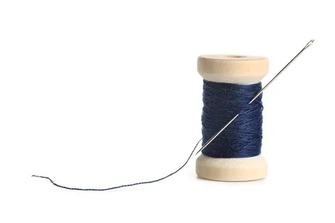 Blue sewing thread with needle on white background Stock Photos