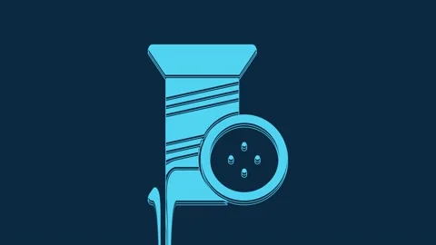 Blue Sewing thread on spool and button icon isolated on blue background. Yarn Stock Footage 235777855