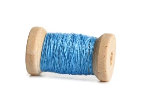 Blue sewing thread on white background Stock Photos