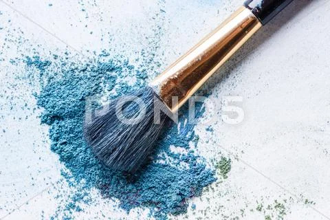 Blue shadows with brush piled on white background Stock Photos