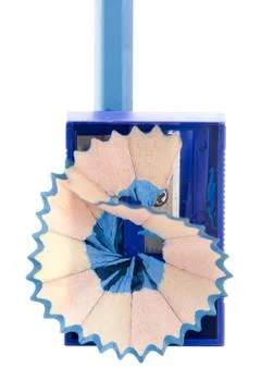 Blue sharpener and pencil Stock Photos