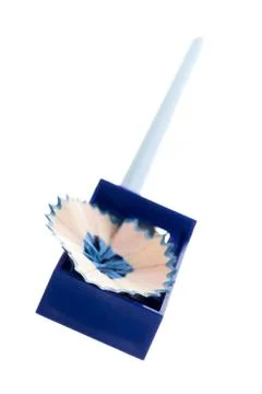 Blue sharpener with blue pencil Stock Photos