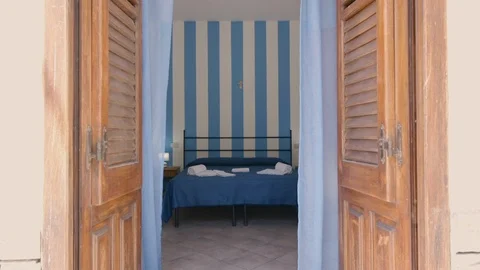 Blue sheets bedoom with blue curtains Stock Footage 87033314