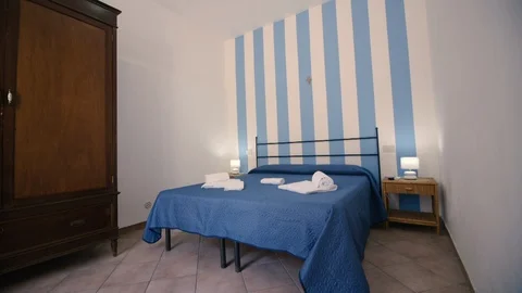 Blue sheets bedroom Stock Footage 87033301