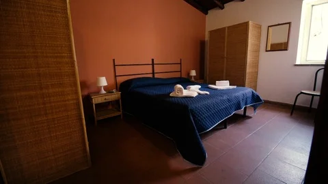 Blue sheets bedroom Stock Footage 87033309