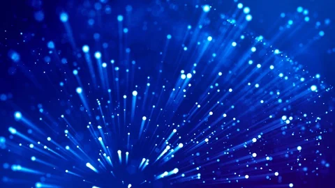 Blue shiny sparkling particles with light rays move in a viscous liquid. It is Stock Footage 130171220