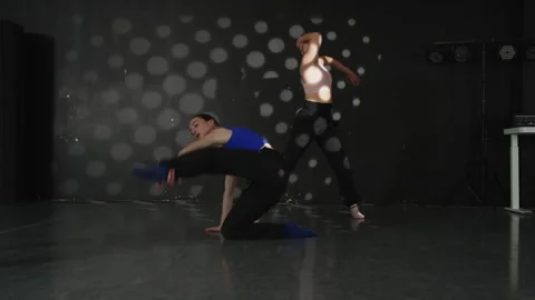 Blue shirt dancer Dance studio contemporary girls routine Stock Footage 305103575