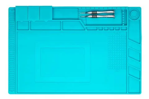Blue Silicone Work Mat with Tools. Top view. Stock Photos