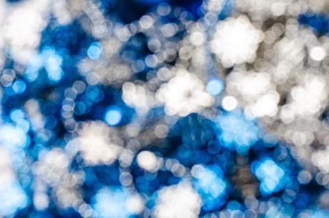 Blue silver blur circle lights as background. Stock Photos