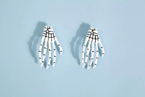 Blue skeleton hand Stock Photos