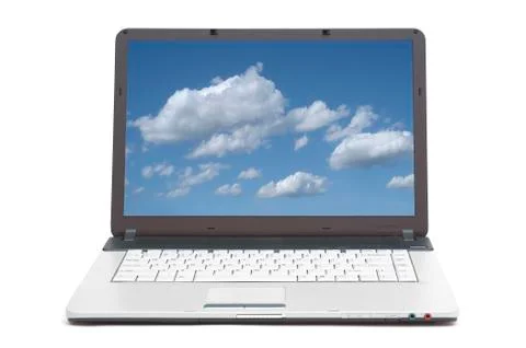 Blue skies on the screen of notebook Stock Photos