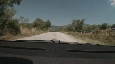 Blue sky above mountains 4K driving video Stock Footage 160483595