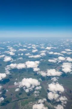 The blue sky among clouds and sunlight Stock Photos