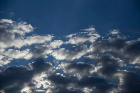 Blue sky among clouds Stock Photos