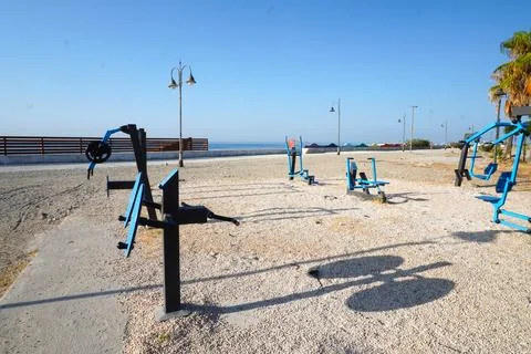 Blue sky and bright exercise machines. 스톡 사진