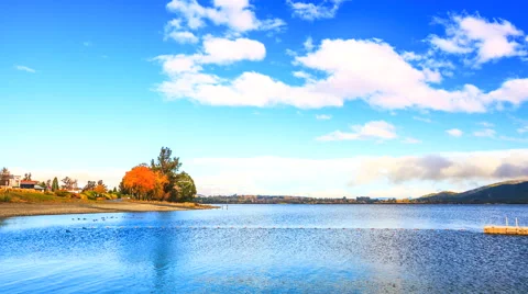 Blue sky and cloud scape at Te Anau lake at South Island of New Zealand Stock Footage 52370187