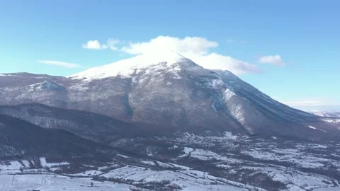 Blue sky and clouds above Rtanj mountain 4K aerial video Stock Footage 105289697
