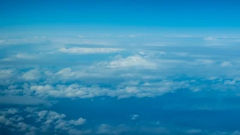Blue sky and clouds from above Stock Footage 123903275