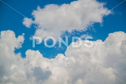 Blue sky and clouds abstract background with copy space. Stock Photos