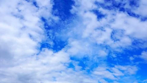 Blue sky and clouds background Stock Photos