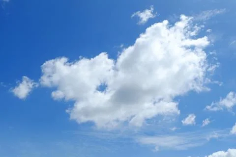 Blue Sky and Clouds Background. Stock Photos