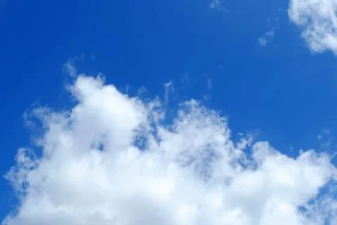 Blue Sky and Clouds Background. Stock Photos