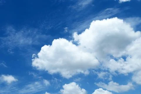 Blue Sky and Clouds Background. Stock Photos