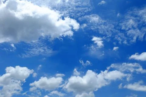 Blue Sky and Clouds Background. Stock Photos