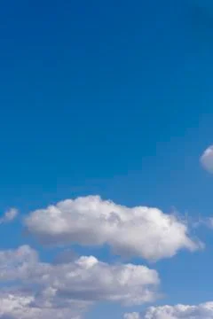 Blue sky and clouds background Stock Photos