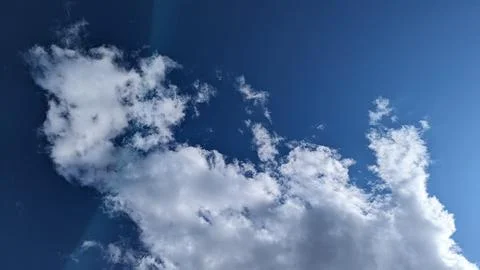 Blue sky and clouds background Stock Photos