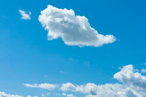 Blue sky and clouds. Horizontal shot Stock Photos
