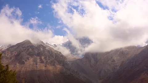Blue sky and clouds over the mountains Stock Footage 125605678