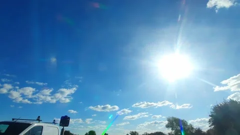 Blue Sky and Clouds over England During Car Drive Stock Footage 320865087