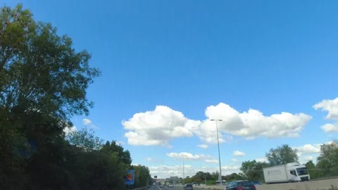 Blue Sky and Clouds over England During Car Drive Video stock 320879871