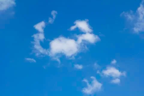 Blue sky and clouds Stock Photos