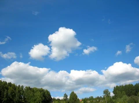 Blue sky and clouds Stock Photos