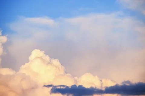 Blue sky and clouds at sunset. Aerial view. Stock Photos